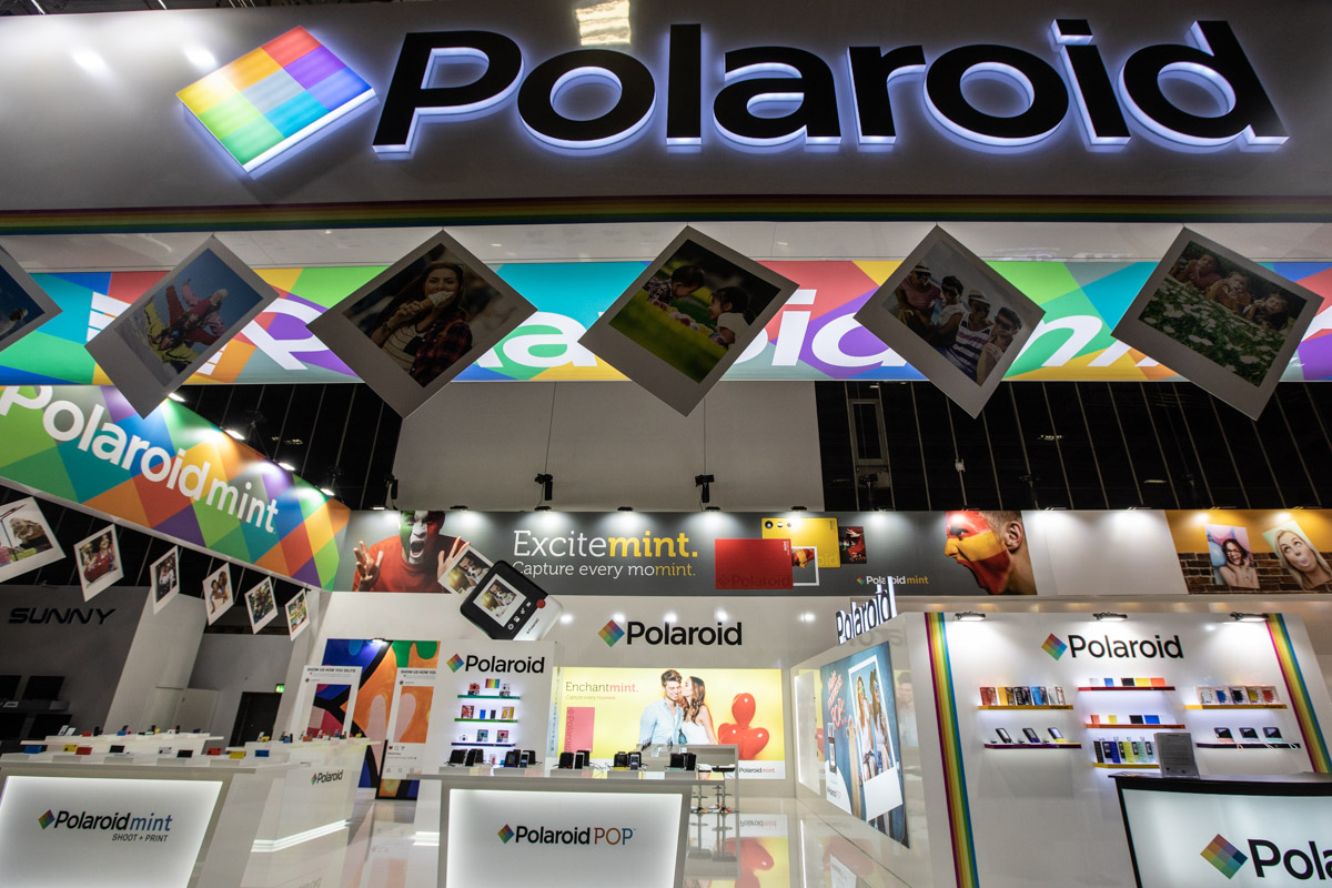 Polaroid at IFA Berlin 2018 — Branding Illuminated Polaroid sign above suspended instant-photo displays at IFA Berlin 2018