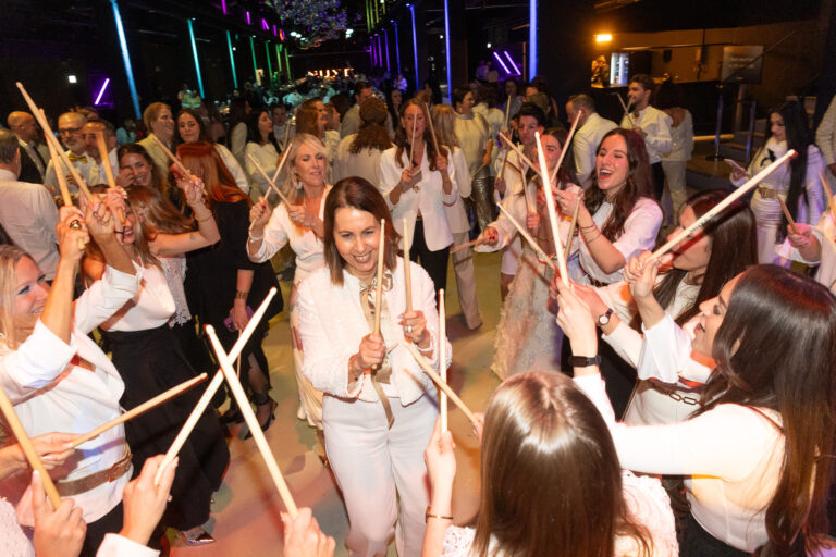 Guests joining an interactive drumming performance