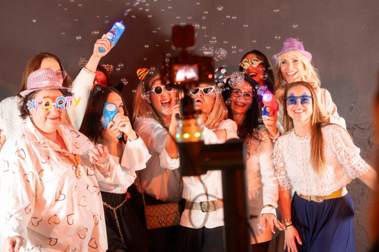 Guests celebrating together at the NUXE party