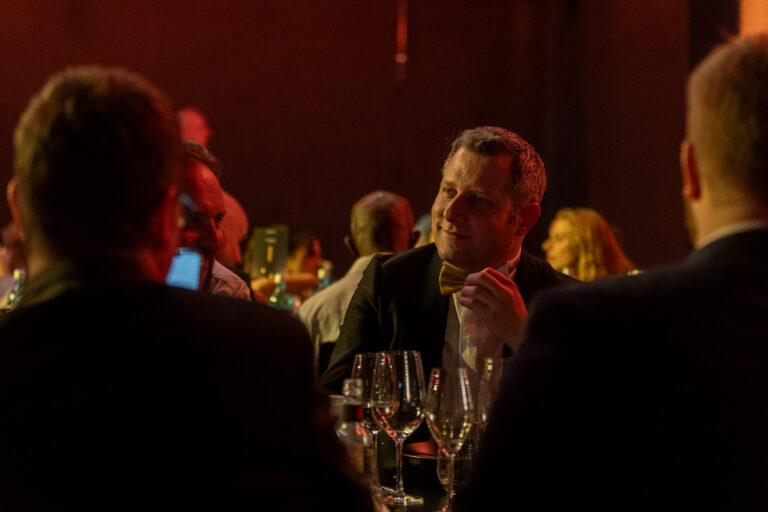 Guests talking during the evening celebration