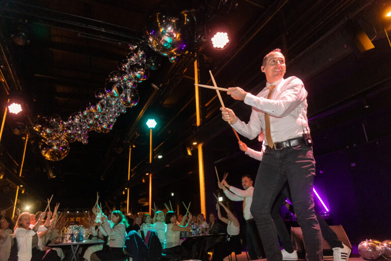 Live drumming performance during the NUXE gala